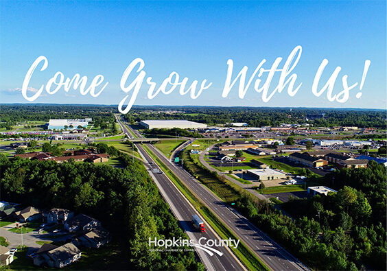 grow with us text overlaying aerial view of hopkins area